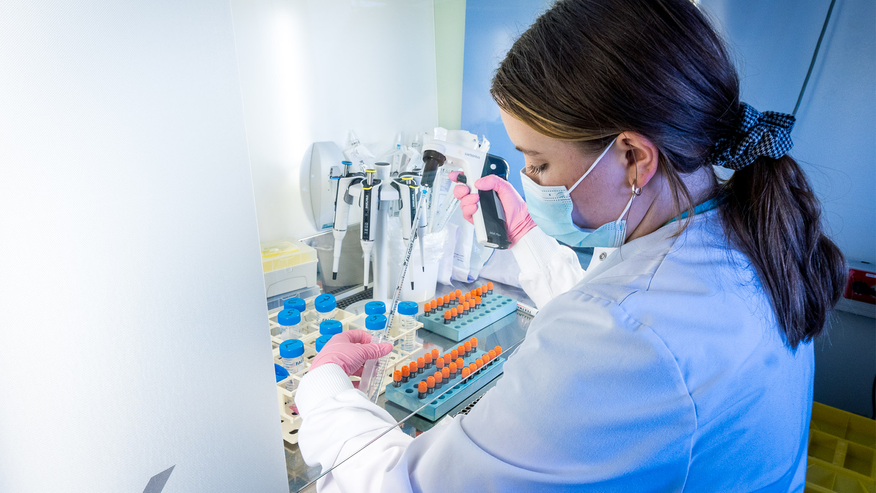 A woman working in a Blood Service laboratory.