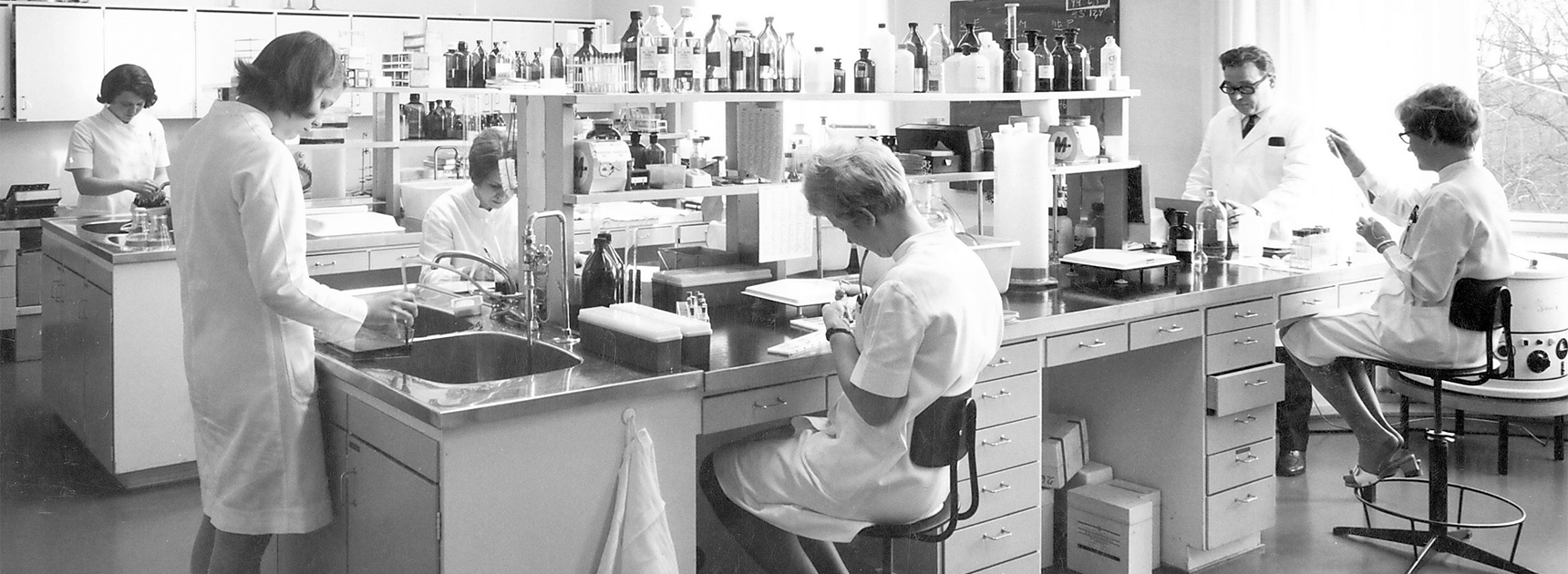 Blood Service laboratory and working people in the 1960s.